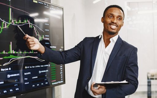 business man going over numbers at meeting