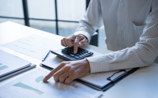 crunching numbers on calculator